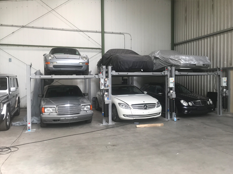 Four post car parking lift