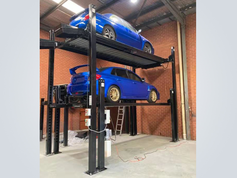 Four post car parking lift