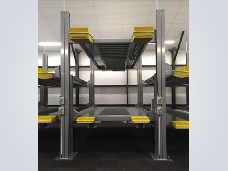 Four post car parking lift