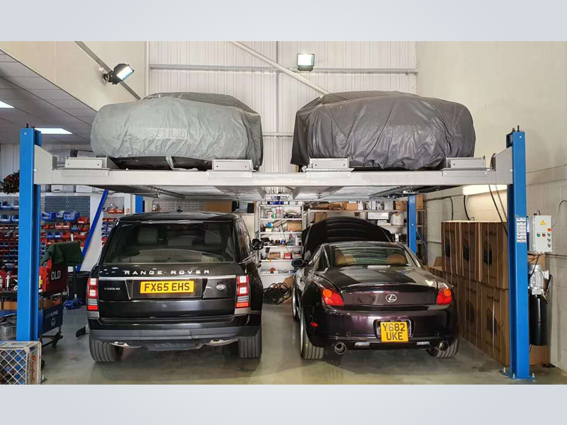 Four post car parking lift