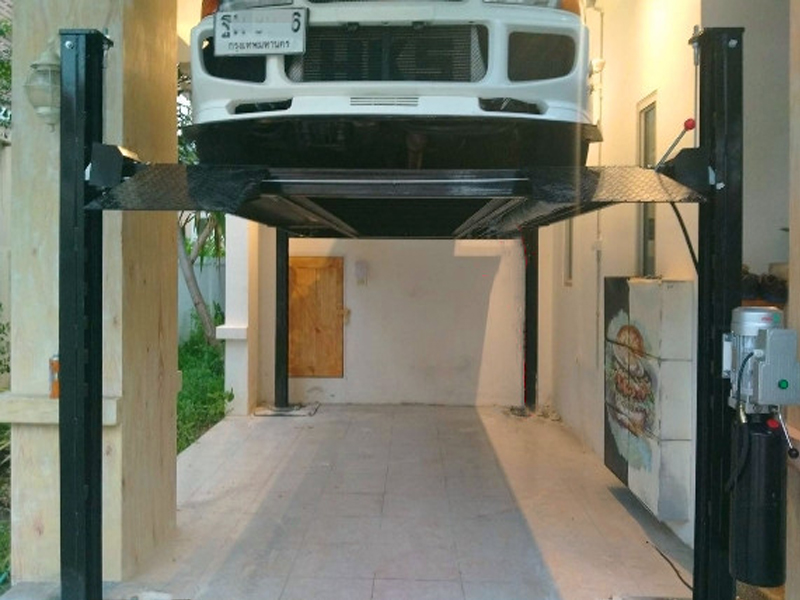 Four post car parking lift
